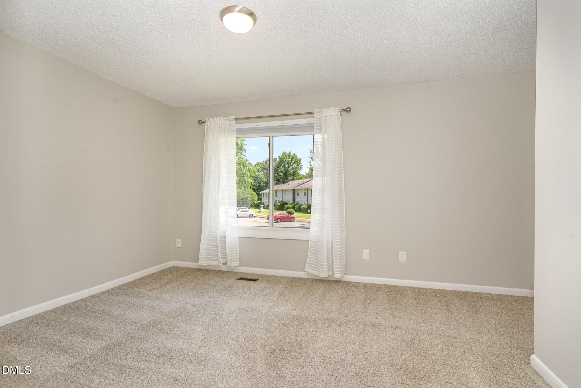 1304 Seaton Road, Unit 1 Durham, NC 27713 - Photo 9 of 20 an empty room with windows