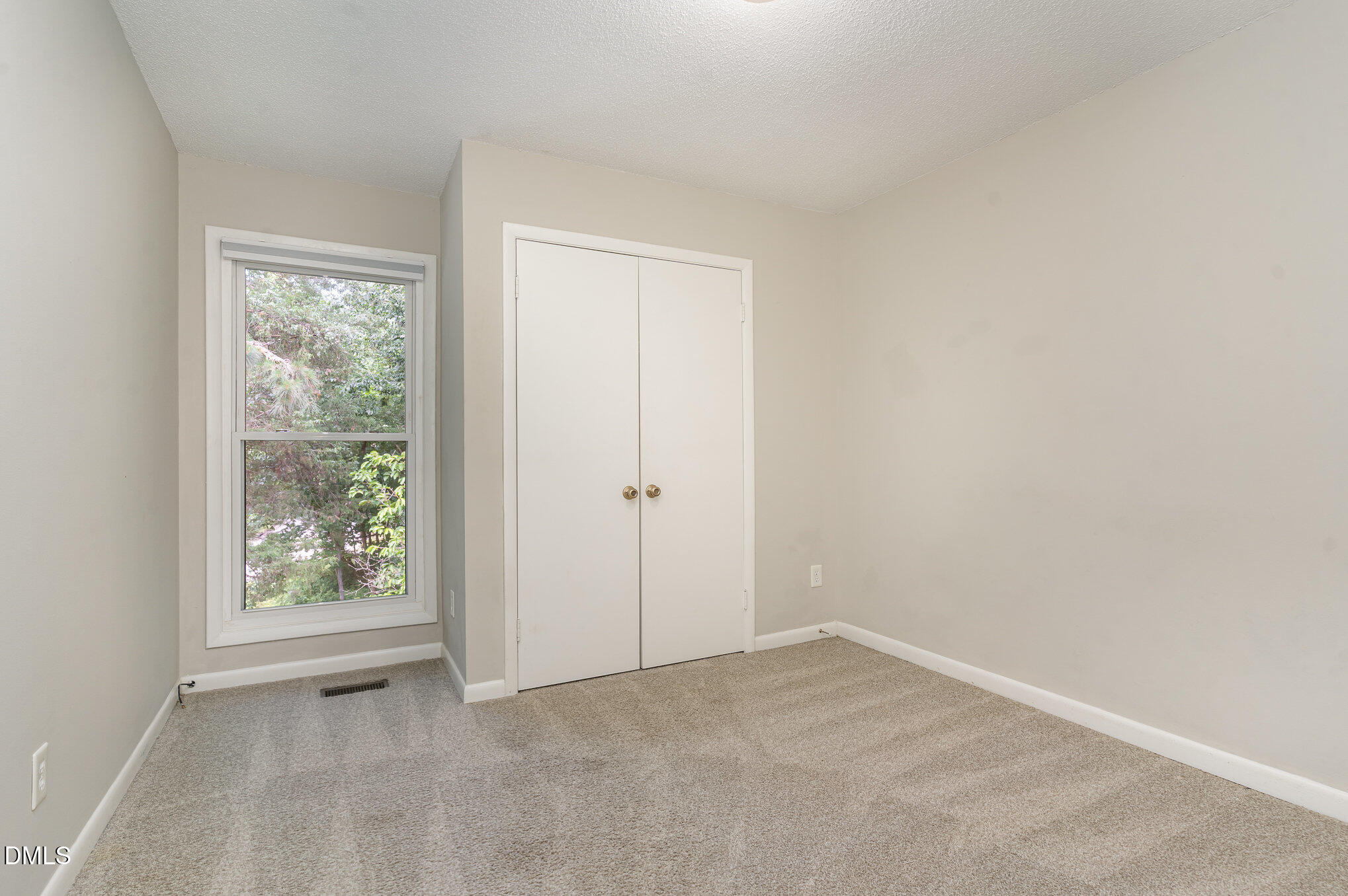 1304 Seaton Road, Unit 1 Durham, NC 27713 - Photo 12 of 20 an empty room with windows