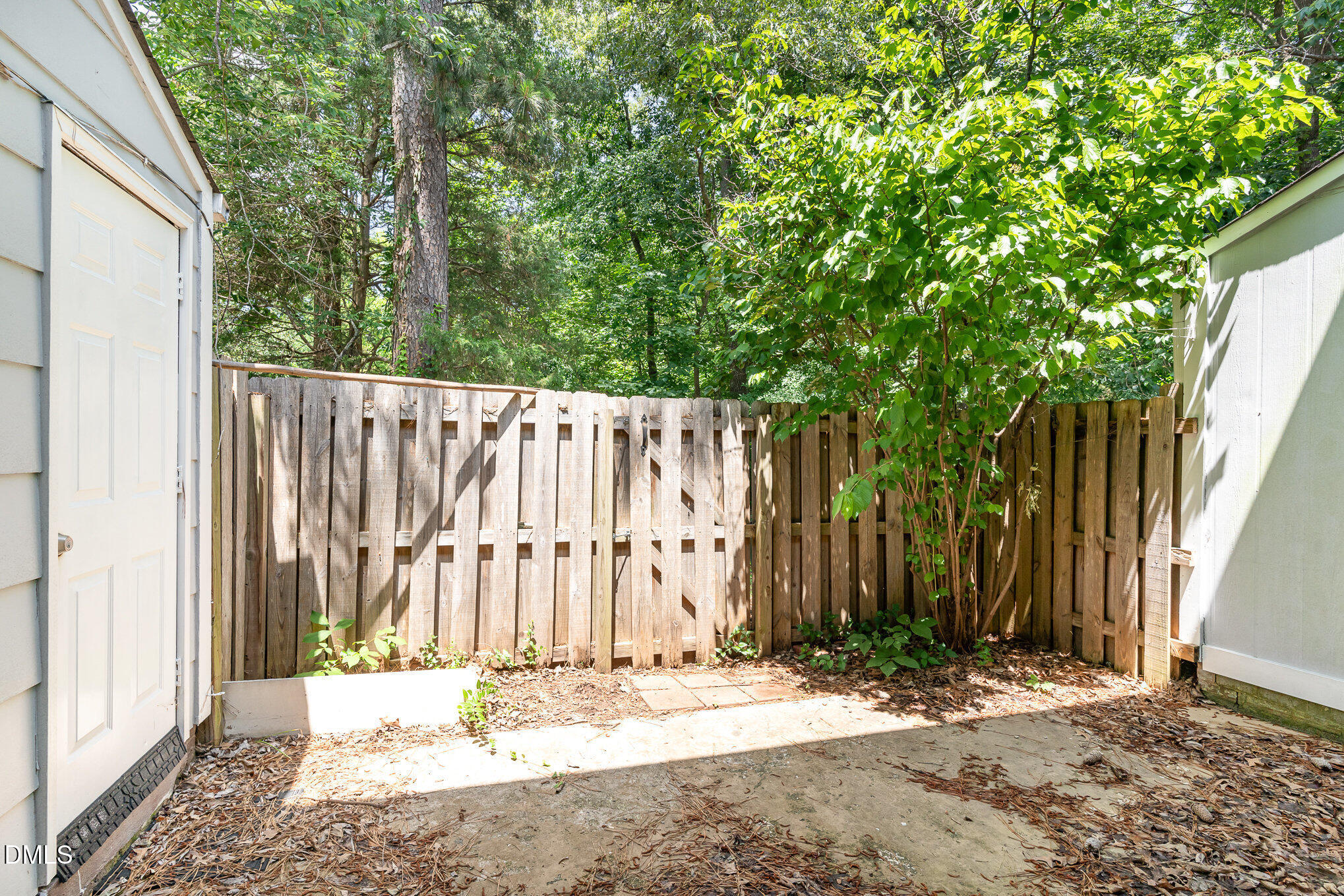 1304 Seaton Road, Unit 1 Durham, NC 27713 - Photo 15 of 20 a view of a entryway with wooden fence