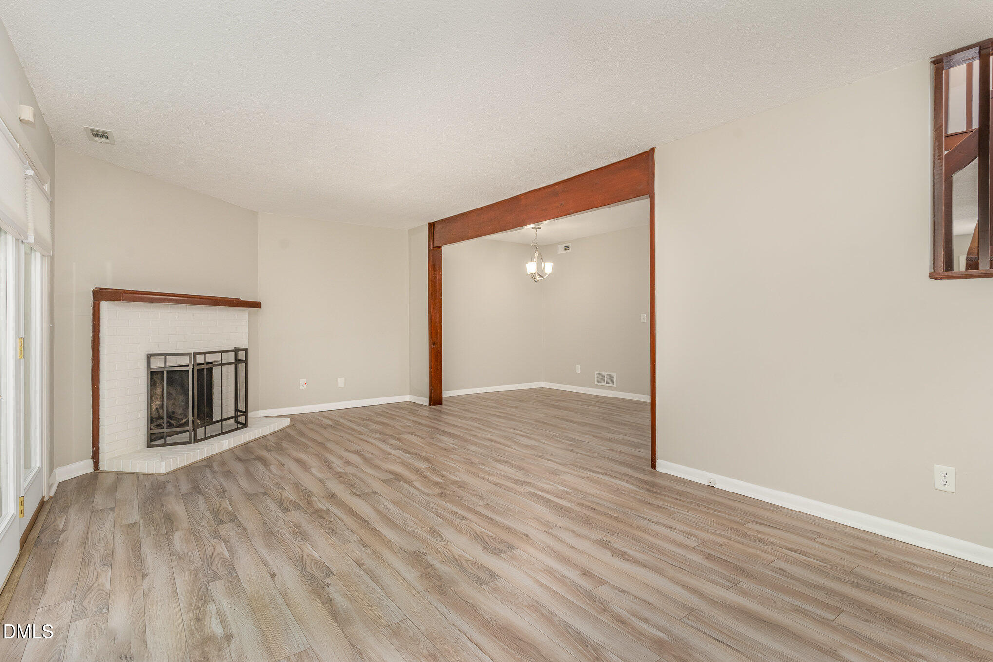 1304 Seaton Road, Unit 1 Durham, NC 27713 - Photo 3 of 20 a view of empty room with wooden floor