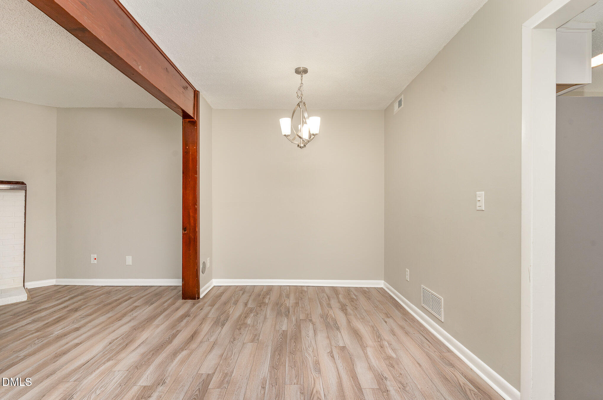 1304 Seaton Road, Unit 1 Durham, NC 27713 - Photo 5 of 20 a view of a room with wooden floor staircase and a hallway