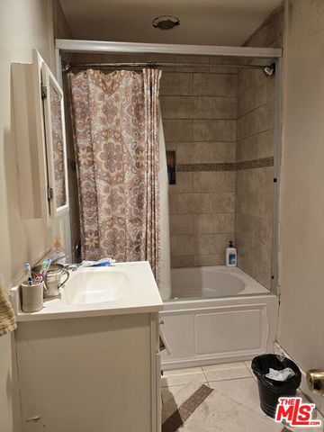 a bathroom with a sink and a bathtub