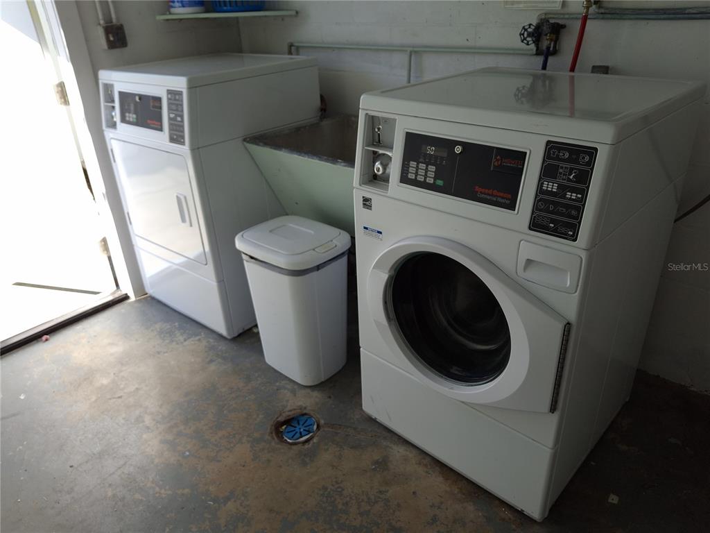 11355 3rd Street East Treasure Island, FL 33706 - Photo 17 of 19 a utility room with dryer and washer