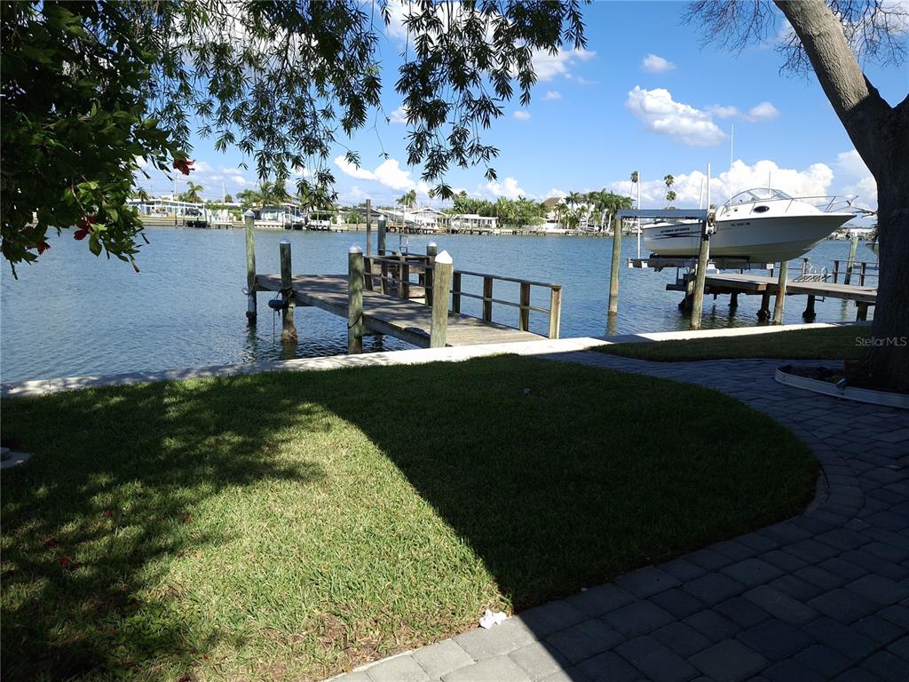 11355 3rd Street East Treasure Island, FL 33706 - Photo 18 of 19 a view of a backyard