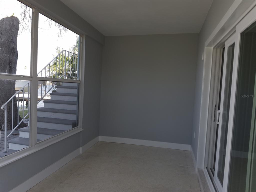 11355 3rd Street East Treasure Island, FL 33706 - Photo 9 of 19 a view of a hallway with stairs