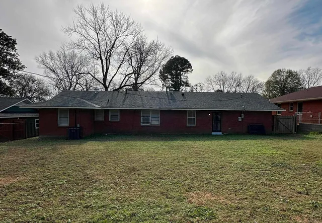 a house view with a garden space