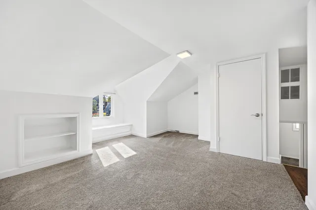 a view of empty room with windows