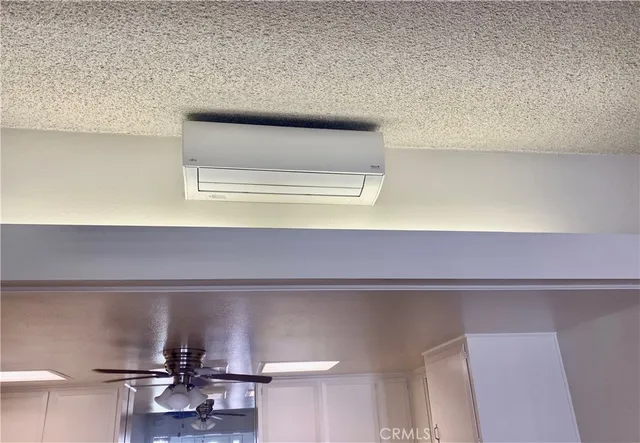 a kitchen with a stove oven and sink