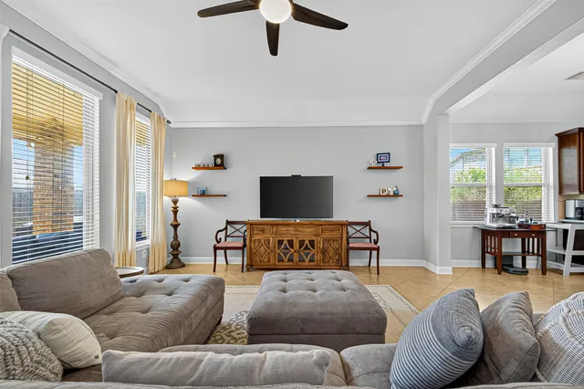 a living room with furniture or couch and a window