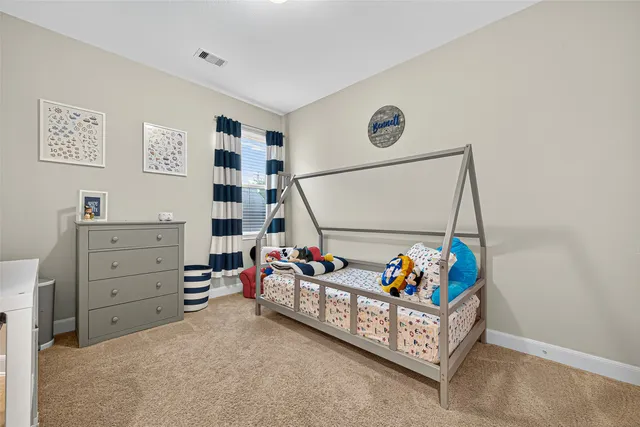 a house view with swimming pool in front of it