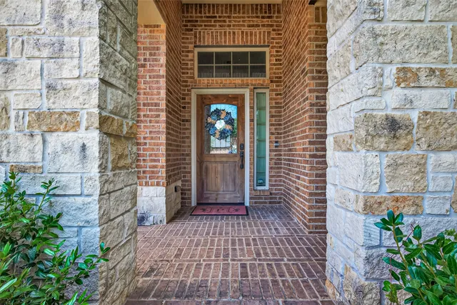 a view of a brick buildings with entryway