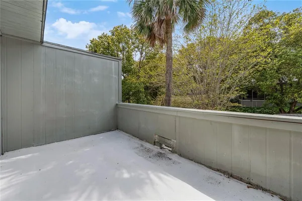 a bathroom with a sink mirror vanity and toilet