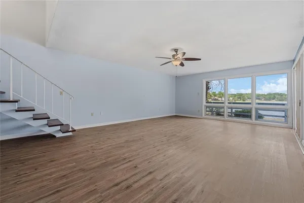 a view of an empty room with a window