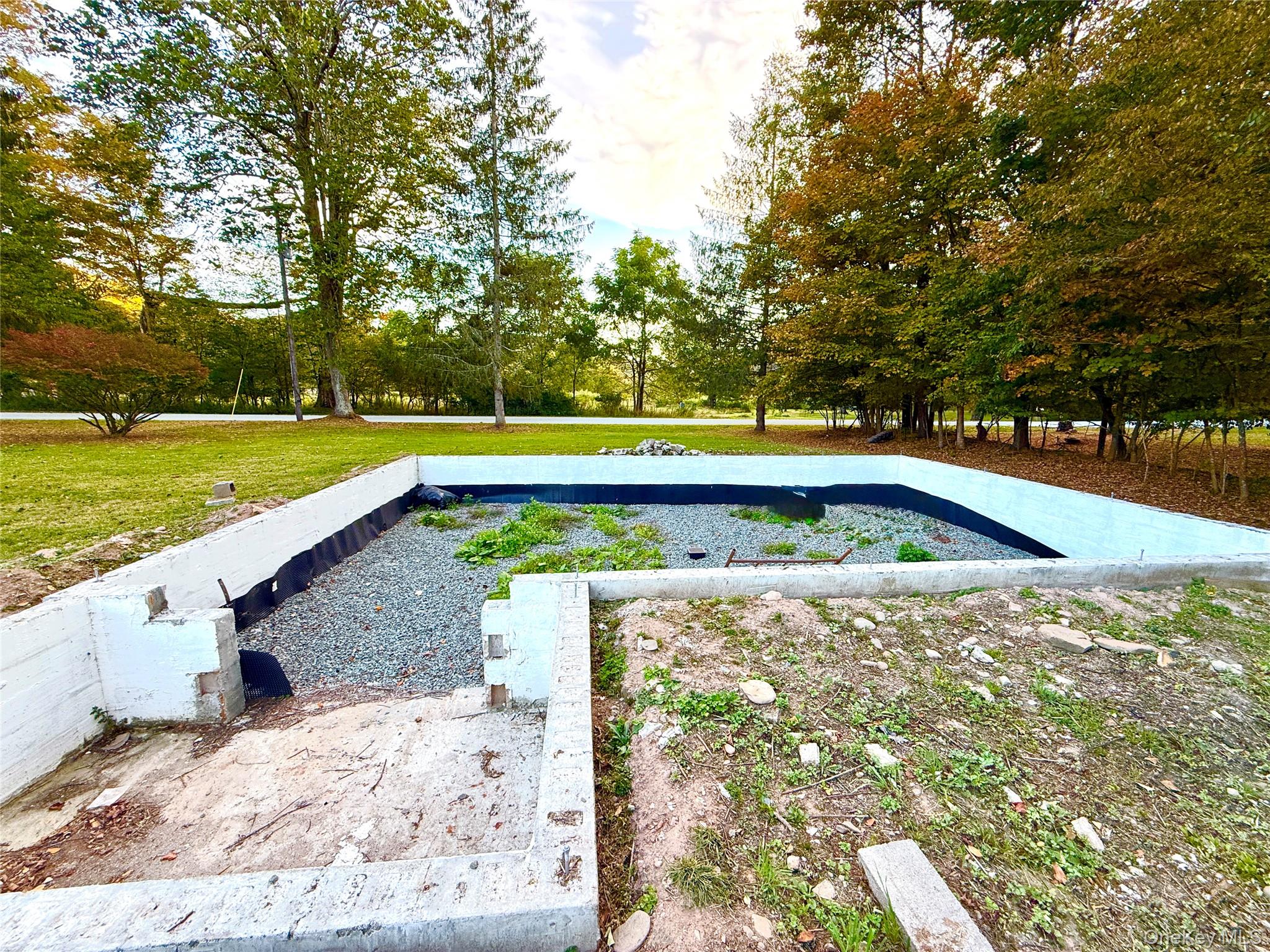 27 Hust Road Jeffersonville, NY 12748 - Photo 11 of 11 a view of a swimming pool with an outdoor space and seating area