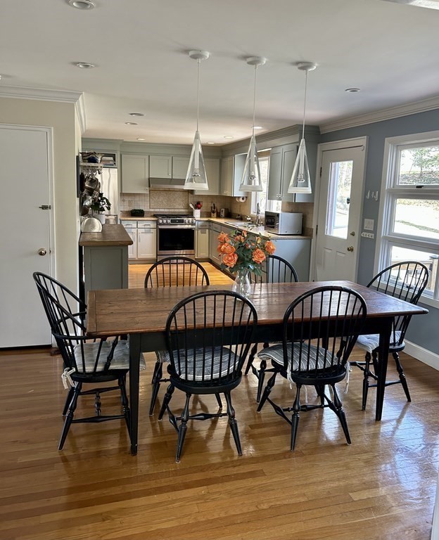 97 Elmwood Road Wellesley, MA 02481 - Photo 5 of 24 a view of a dining room with furniture and wooden floor