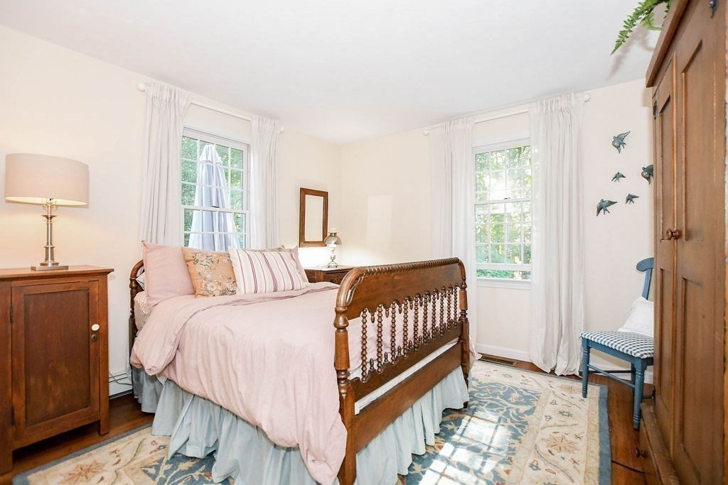 12 Forster Road Rochester, MA 02770 - Photo 15 of 42 a bedroom with a bed and a window
