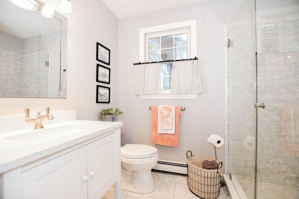 12 Forster Road Rochester, MA 02770 - Photo 17 of 42 a bathroom with a sink toilet and shower