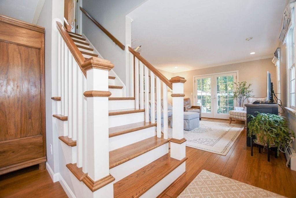 12 Forster Road Rochester, MA 02770 - Photo 18 of 42 a living room with furniture and a floor to ceiling window