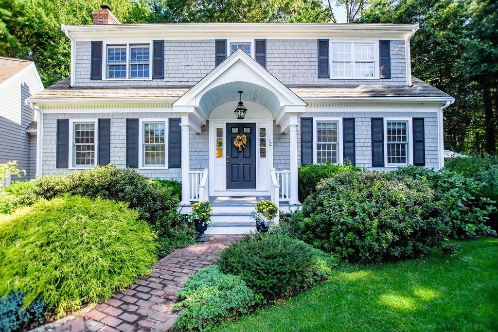 12 Forster Road Rochester, MA 02770 - Photo 2 of 42 a front view of a house with garden