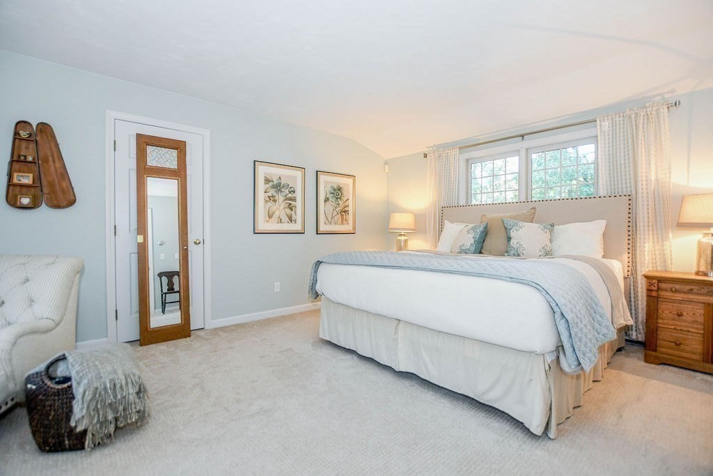 12 Forster Road Rochester, MA 02770 - Photo 27 of 42 a spacious bedroom with a bed and a window