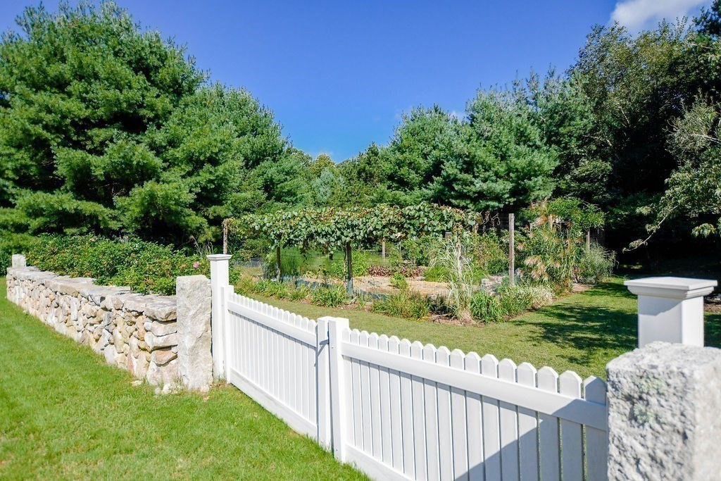 12 Forster Road Rochester, MA 02770 - Photo 38 of 42 a view of a deck and yard with green space