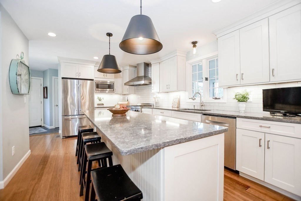 12 Forster Road Rochester, MA 02770 - Photo 6 of 42 a kitchen with stainless steel appliances granite countertop a sink a stove and refrigerator