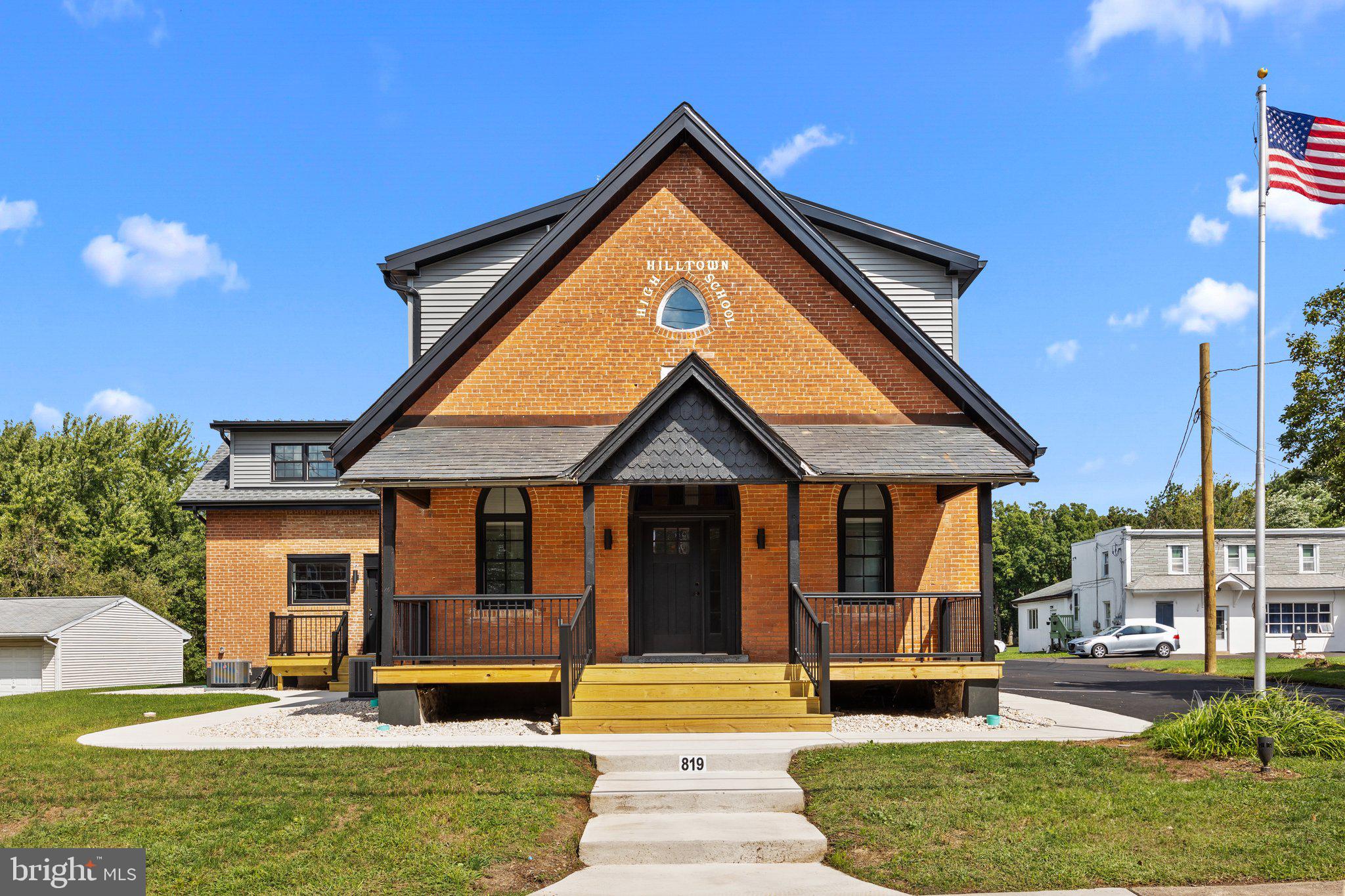 819 Blooming Glen Road, Unit 4 Perkasie, PA 18944 - Photo 2 of 21 a front view of a house with a yard