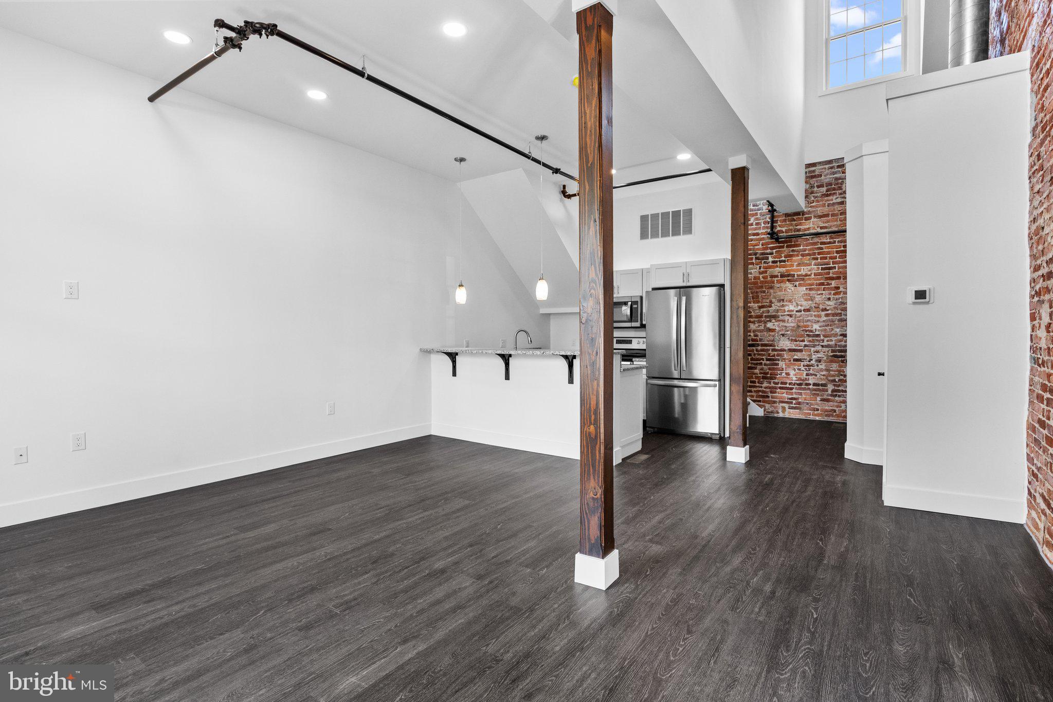 819 Blooming Glen Road, Unit 4 Perkasie, PA 18944 - Photo 7 of 21 a view of a hallway with wooden floors