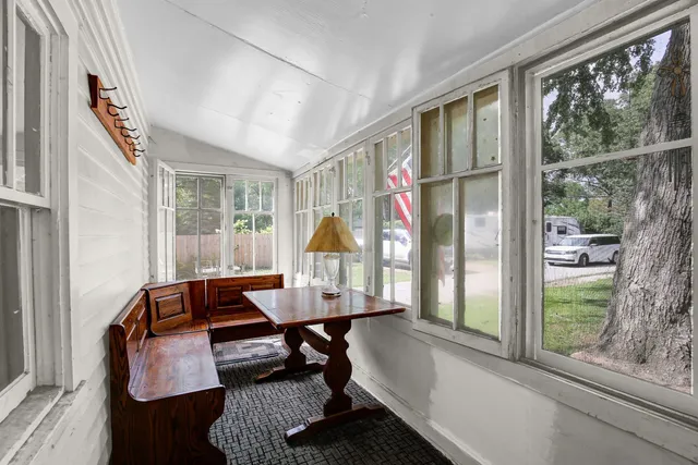 a room with furniture and a window