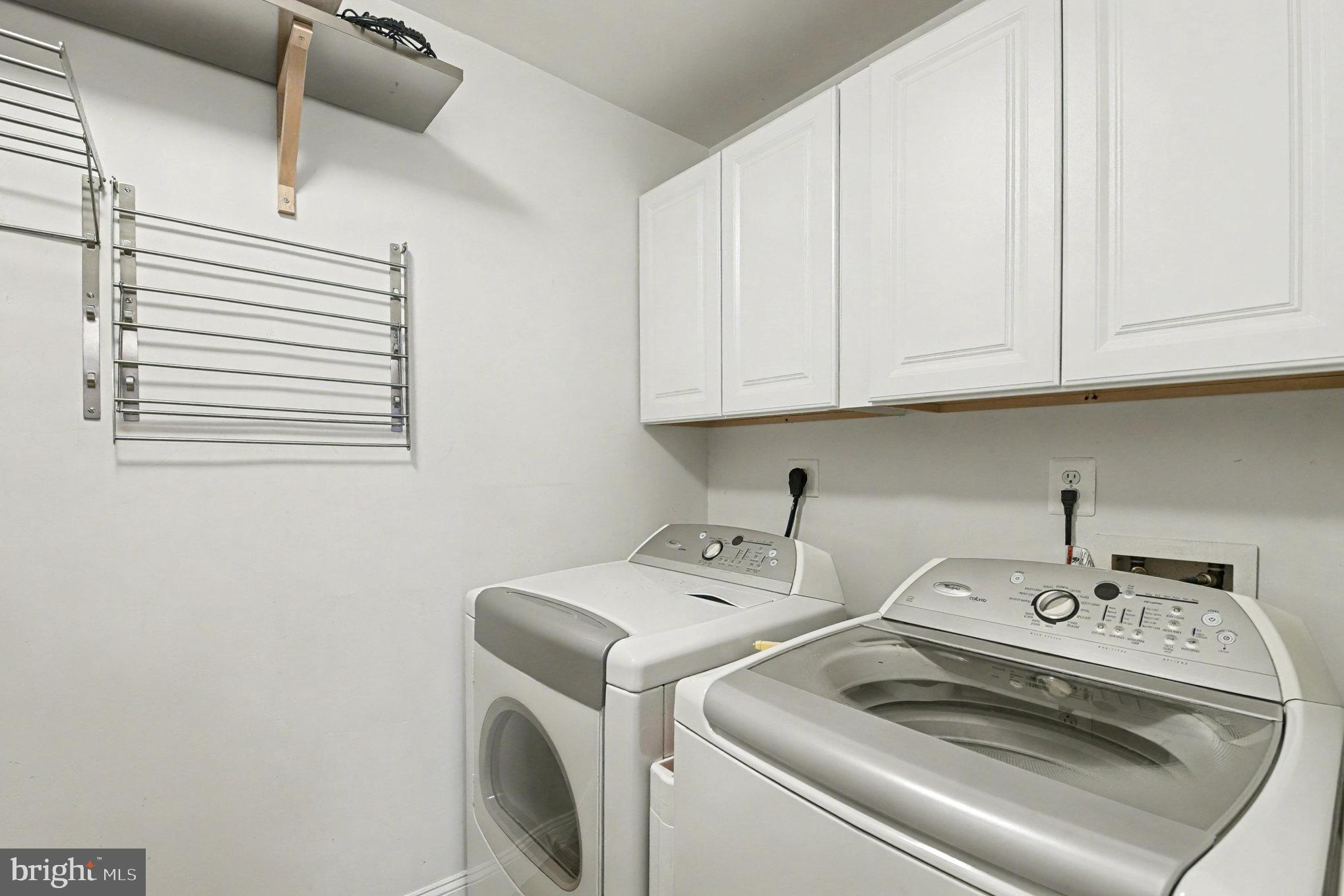 2804 7th Street Sparrows Point, MD 21219 - Photo 19 of 70 a utility room with dryer and washer