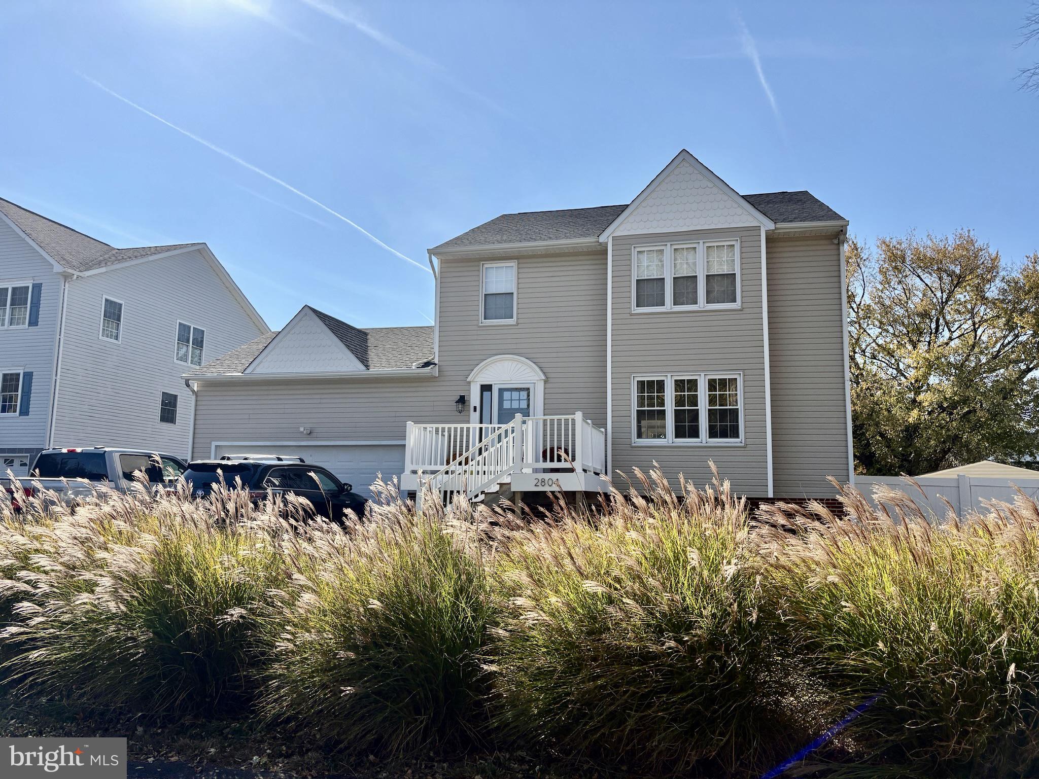 2804 7th Street Sparrows Point, MD 21219 - Photo 2 of 70 a front view of a house with a yard