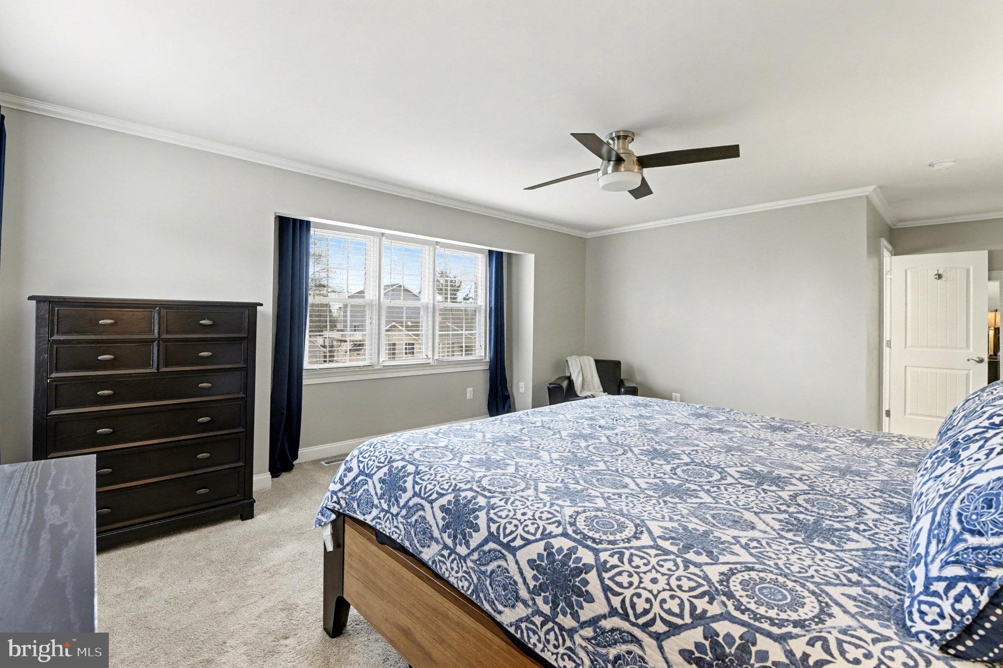2804 7th Street Sparrows Point, MD 21219 - Photo 21 of 70 a bedroom with a bed and a dresser