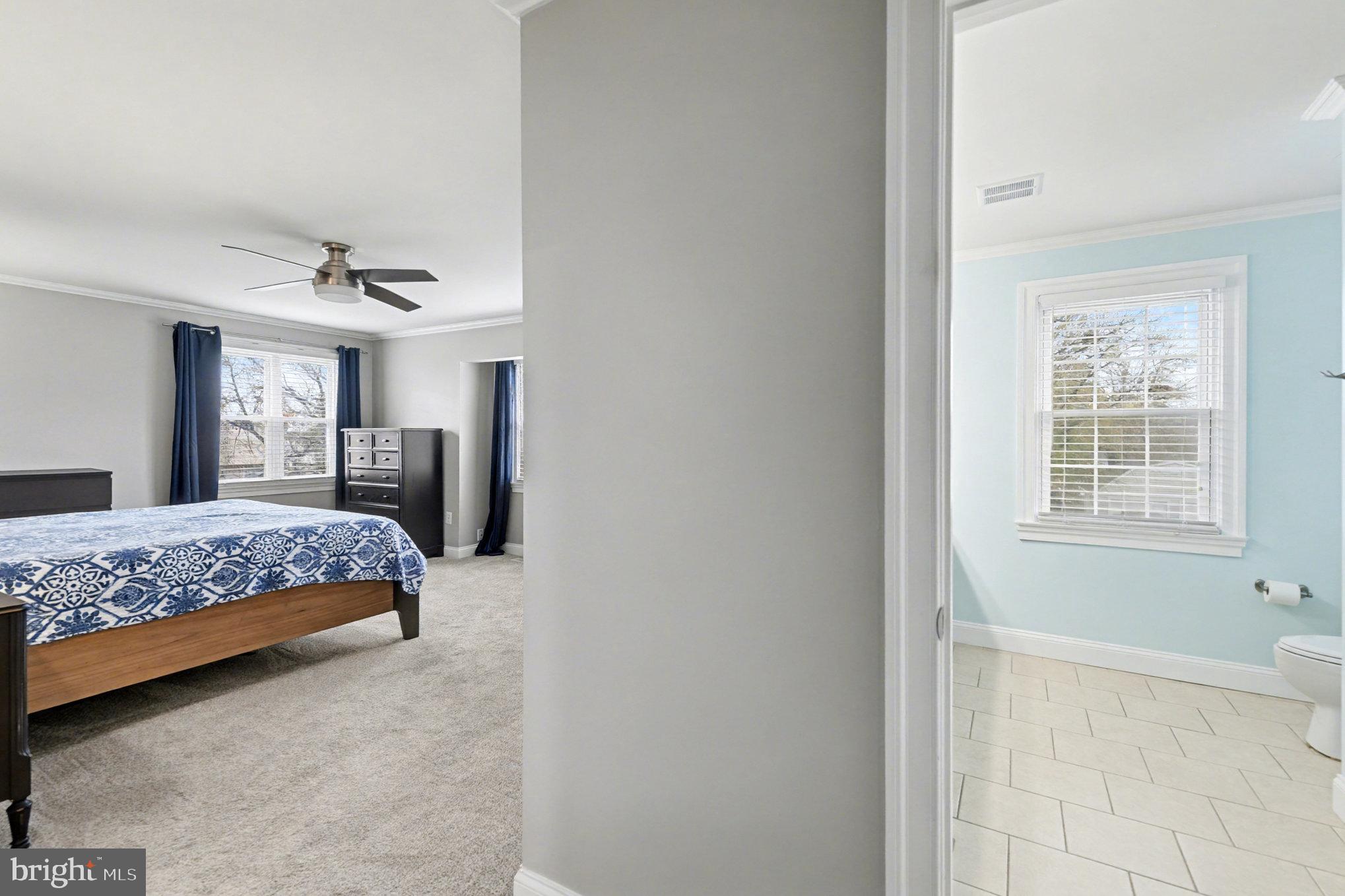 2804 7th Street Sparrows Point, MD 21219 - Photo 23 of 70 a bedroom with a bed and a window