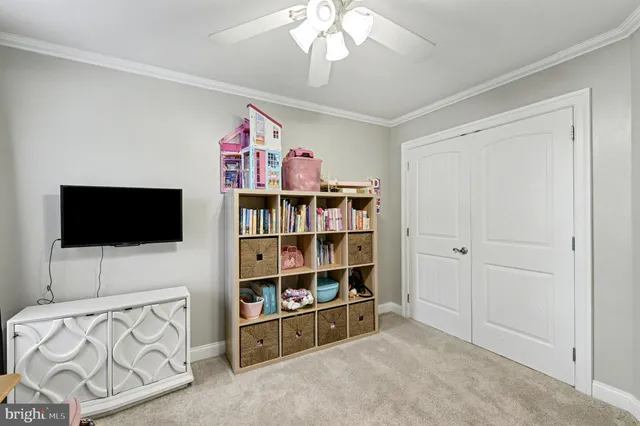 a view of bedroom with furniture and workspace