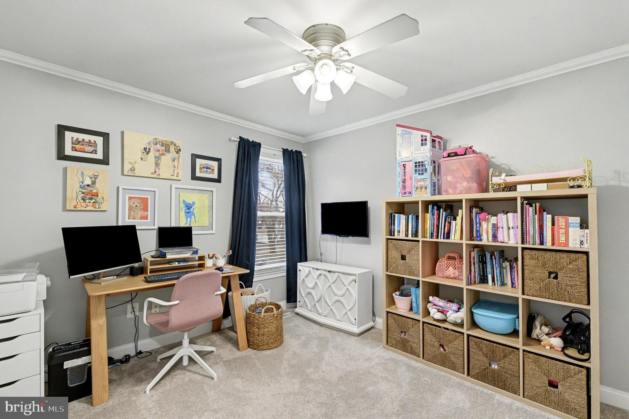 2804 7th Street Sparrows Point, MD 21219 - Photo 32 of 70 a workspace with a bookshelf