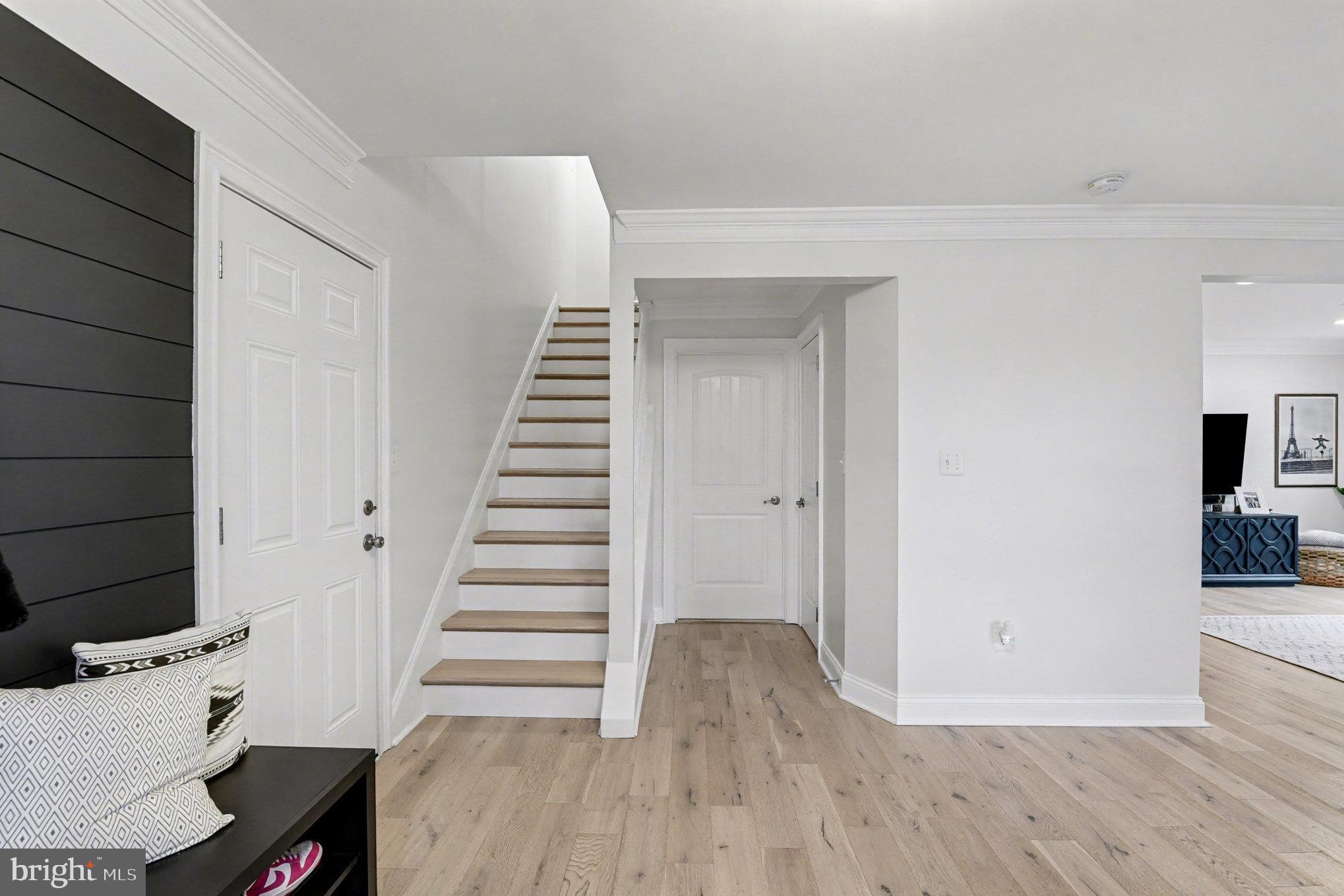 2804 7th Street Sparrows Point, MD 21219 - Photo 4 of 70 a view of a room with wooden floor and stairs