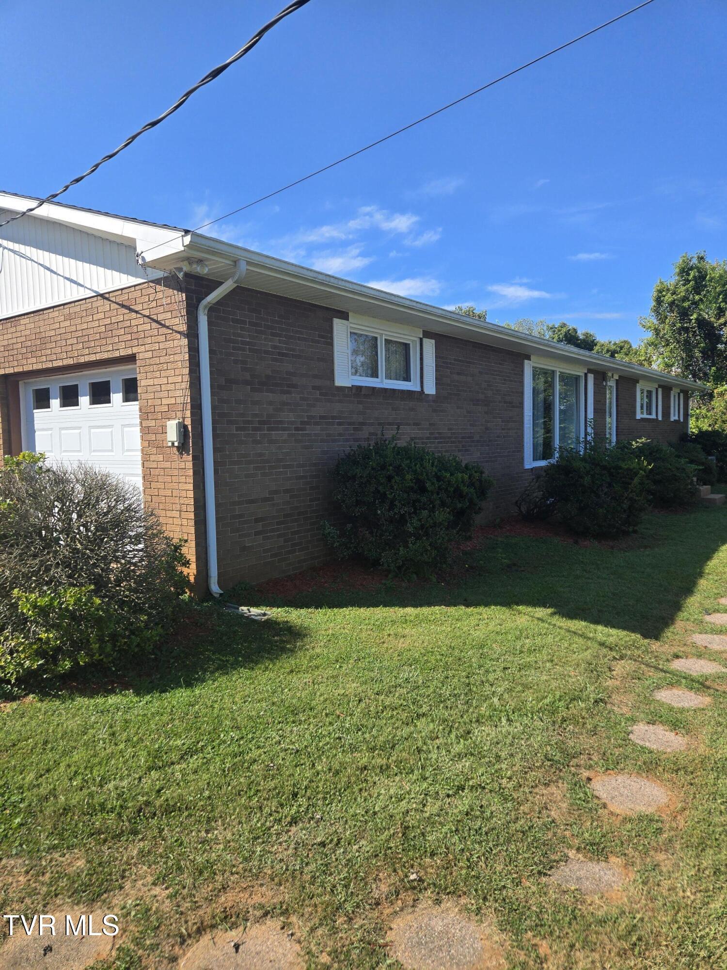 720 North Mohawk Drive Erwin, TN 37650 - Photo 2 of 39 20250920_110041