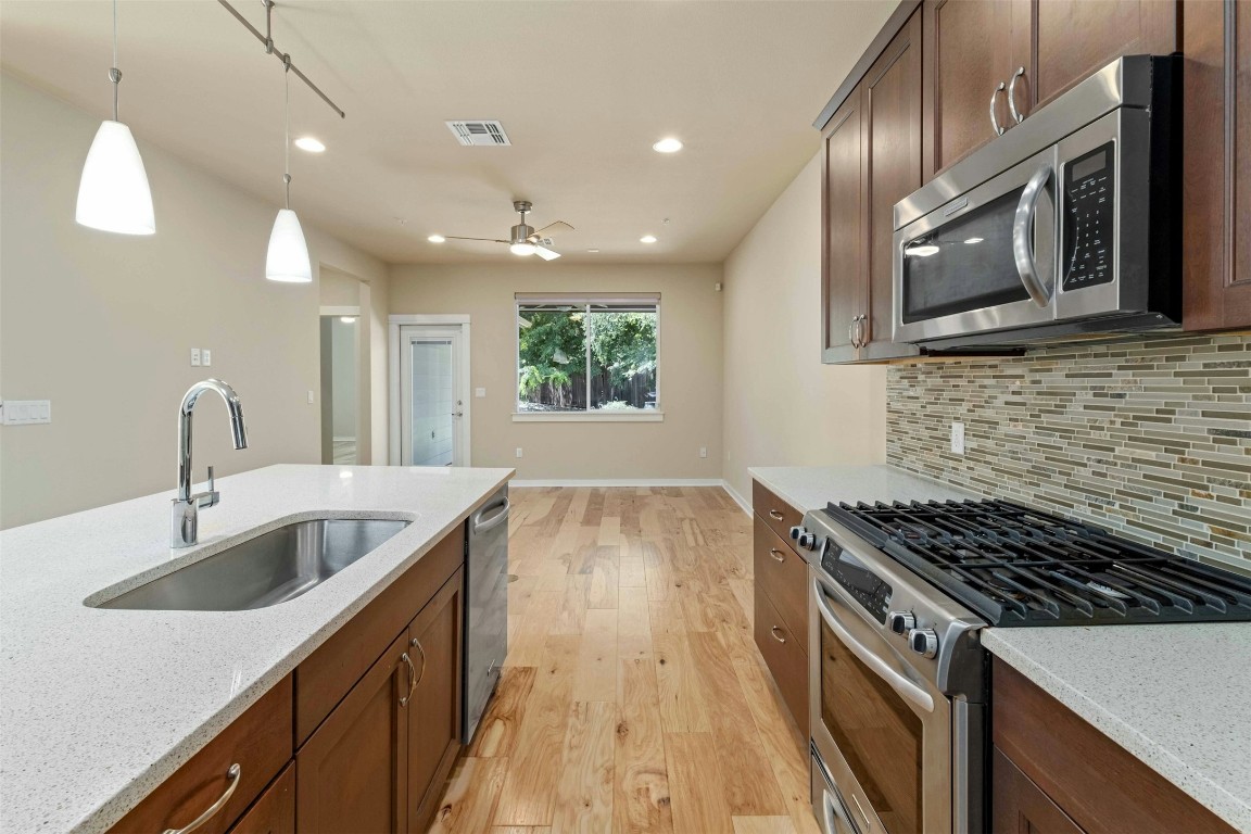 4008 Valley View Road, Unit B Austin, TX 78704 - Photo 7 of 21 a kitchen that has a sink and a stove