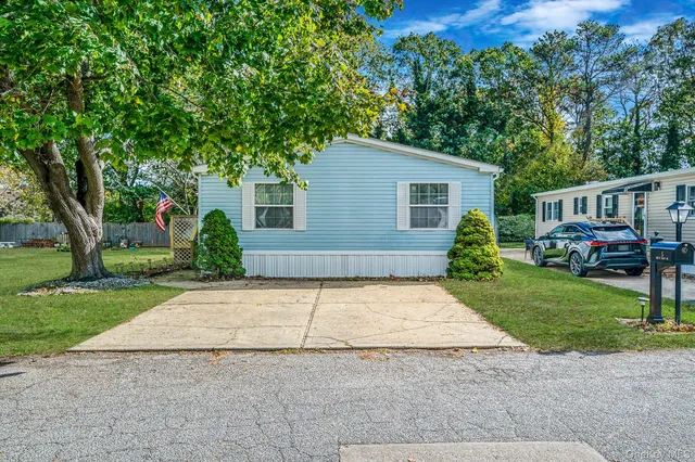 front view of house with a yard
