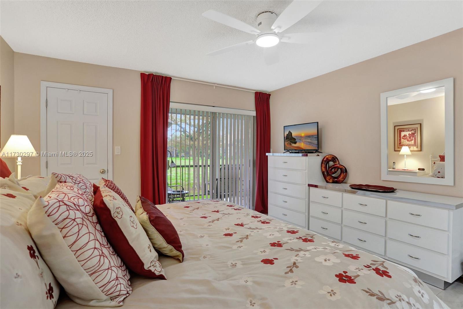 6080 Northwest 44th Street, Unit 212 Lauderhill, FL 33319 - Photo 15 of 44 a bedroom with a bed and a dresser