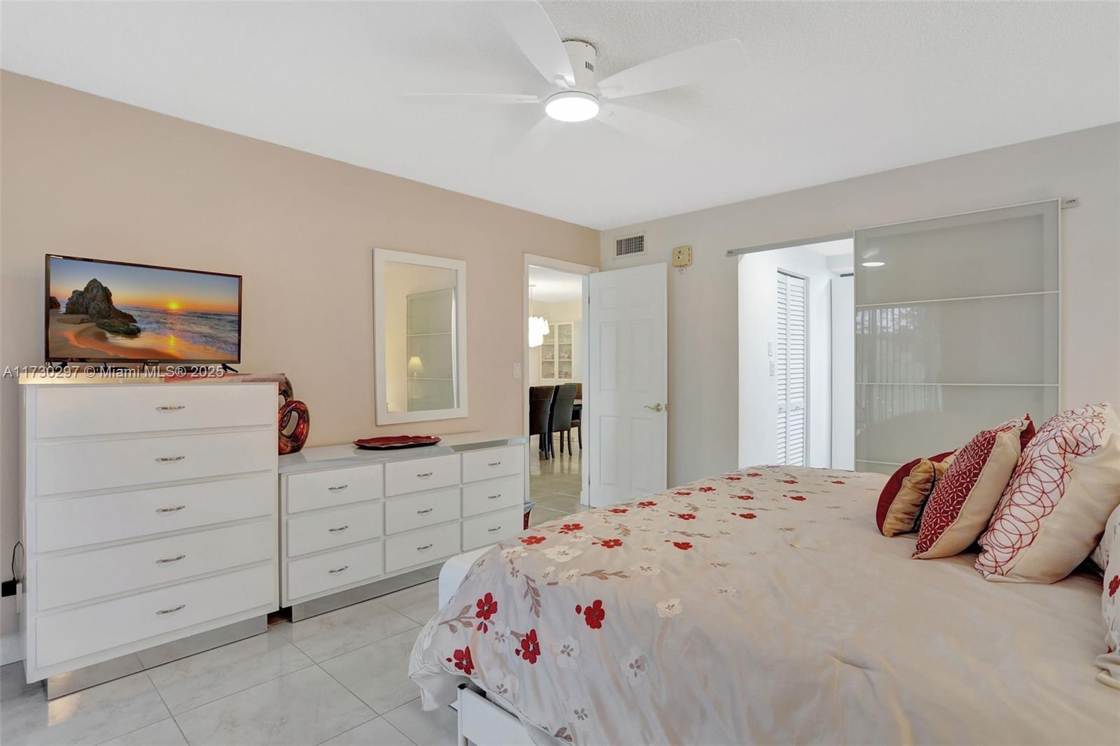 6080 Northwest 44th Street, Unit 212 Lauderhill, FL 33319 - Photo 16 of 44 a bedroom with a bed and a closet