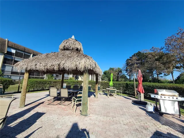 a view of a swimming pool with a garden