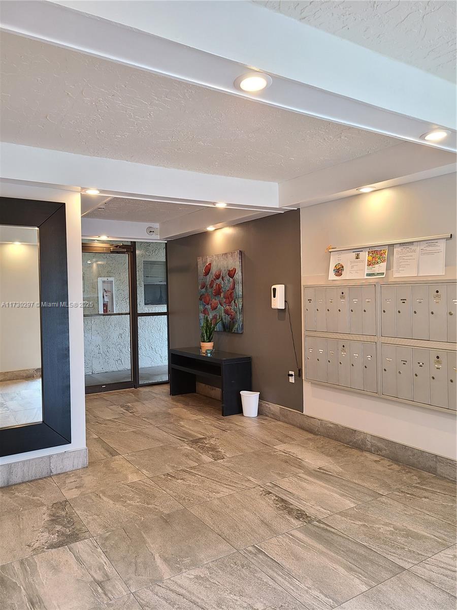 6080 Northwest 44th Street, Unit 212 Lauderhill, FL 33319 - Photo 37 of 44 a view of a livingroom and a bathroom