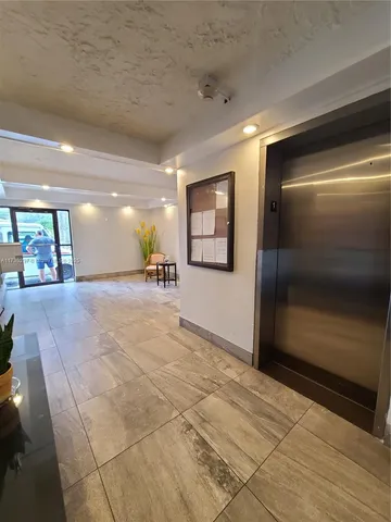 a view of a porch with a yard