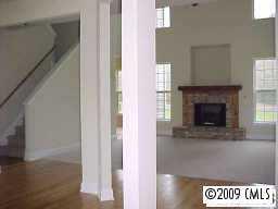 728 Baucom Road Monroe, NC 28110 - Photo 2 of 6 a view of livingroom and fireplace