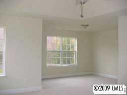 728 Baucom Road Monroe, NC 28110 - Photo 6 of 6 a view of an empty room with a window