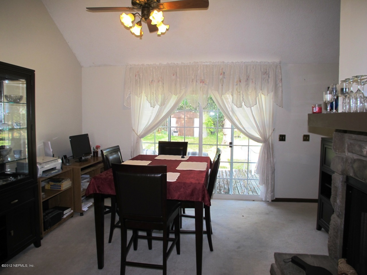 11745 Wattle Tree Road North Jacksonville, FL 32246 - Photo 6 of 18 a view of a dining room with furniture window and outside view