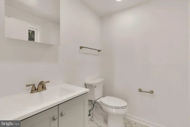 a bathroom with a sink and a toilet