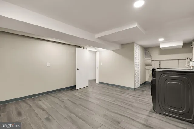 a view of a storage & utility room with washer and dryer