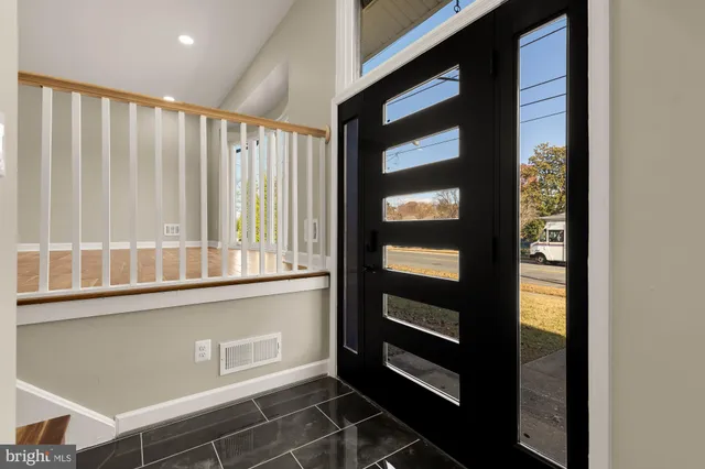 a view of a door and a window